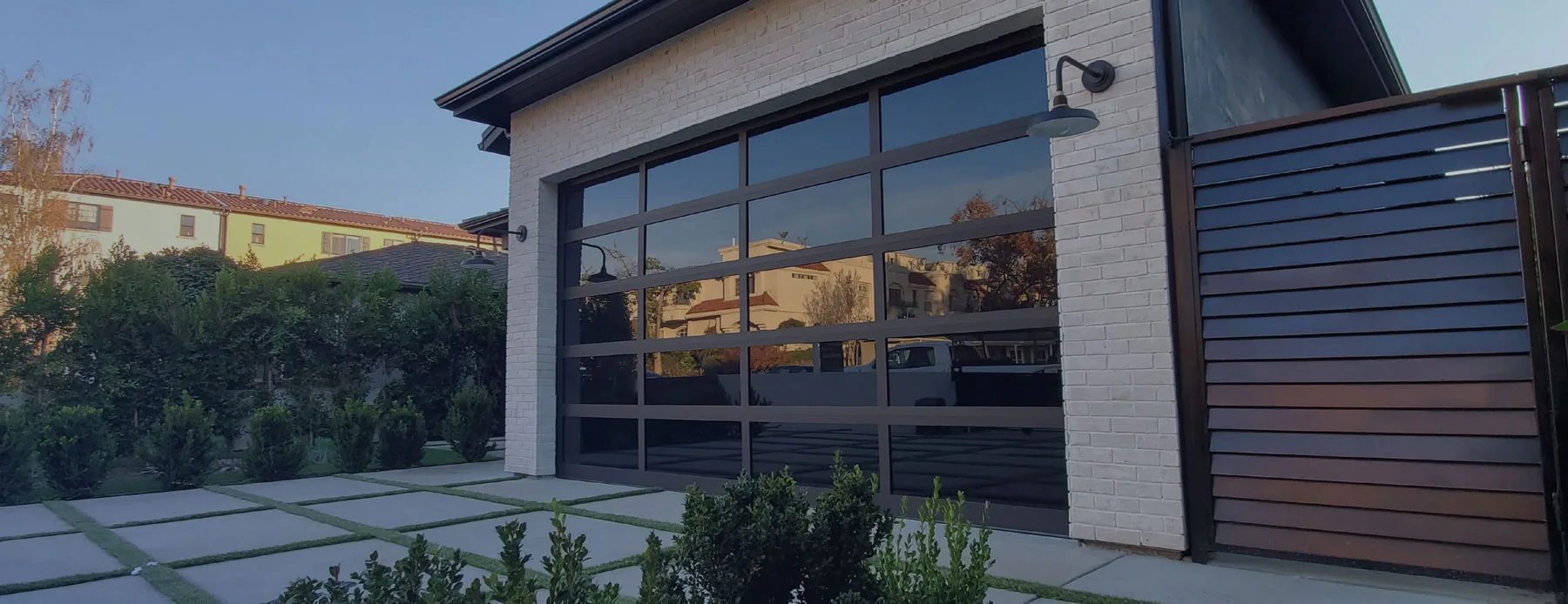 Modern driveway gate and fence installation in Los Angeles